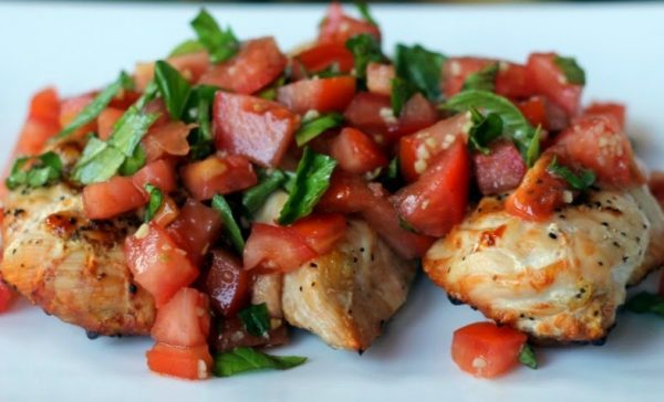An up close picture of Bruschetta Chicken with tomatoes